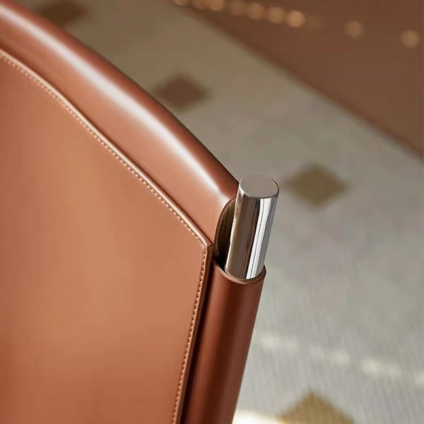 Koko Chair: A trendy, luxurious, comfortable, saddle-leather antique chair for home use.